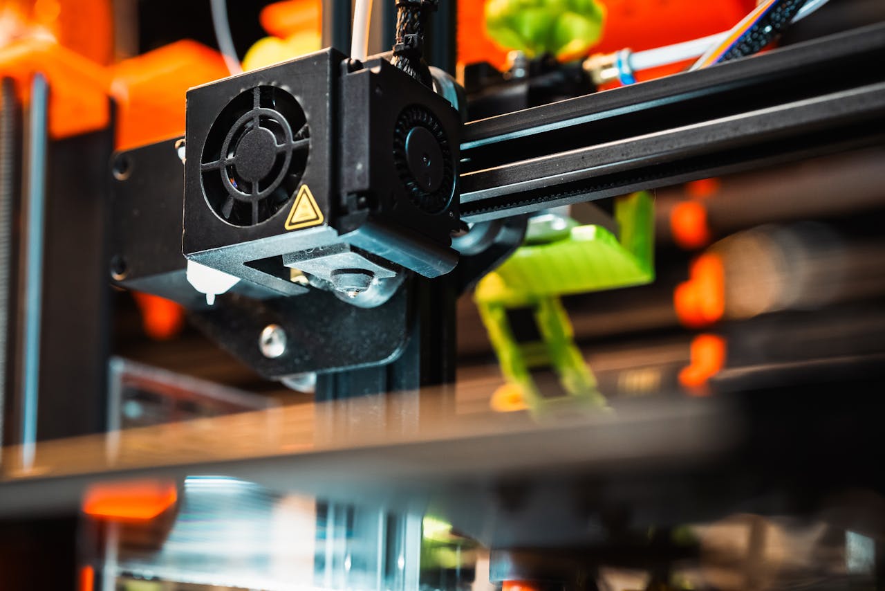 A close-up of a 3D printer in action, showcasing the precision and efficiency that contract manufacturers use to produce high-quality components for various industries.