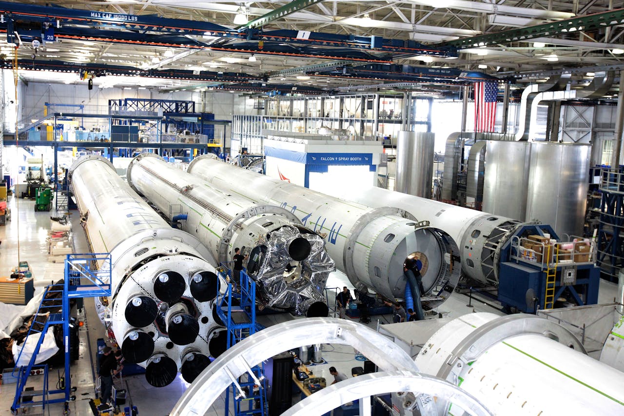 A high-tech OEM manufacturing facility specializing in precision engineering, showcasing the assembly of advanced aerospace components.